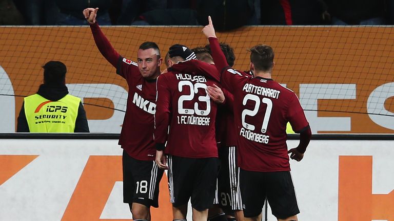 Josip Drmic of Nuernberg celebrates with team mates