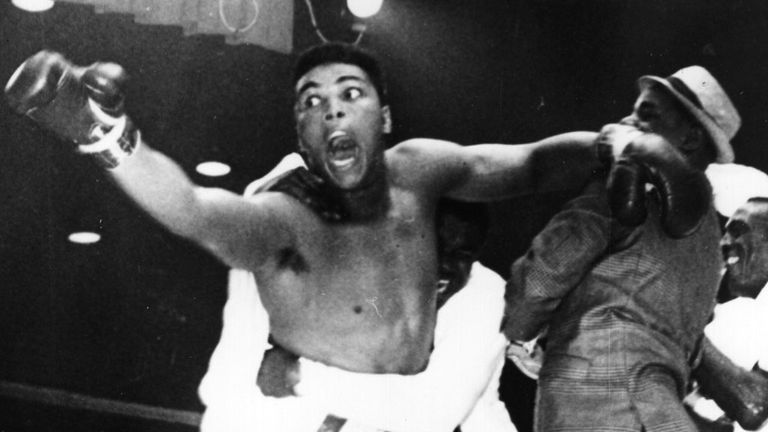 Clay celebrates one of the biggest upsets in heavyweight history