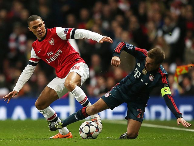 Kieran Gibbs and Philipp Lahm tangle