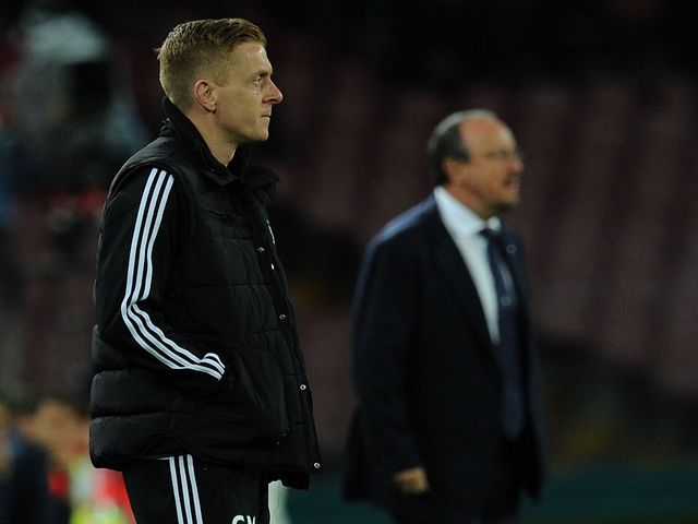 Garry Monk and Rafa Benitez watch the action