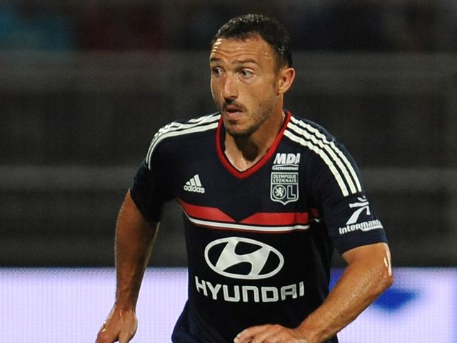 Lyon's Steed Malbranque went close to scoring