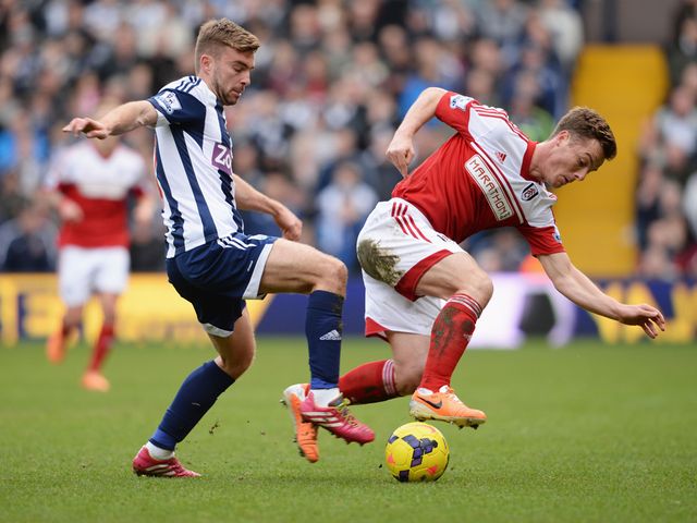 Scott Parker of Fulham battles with James Morrison