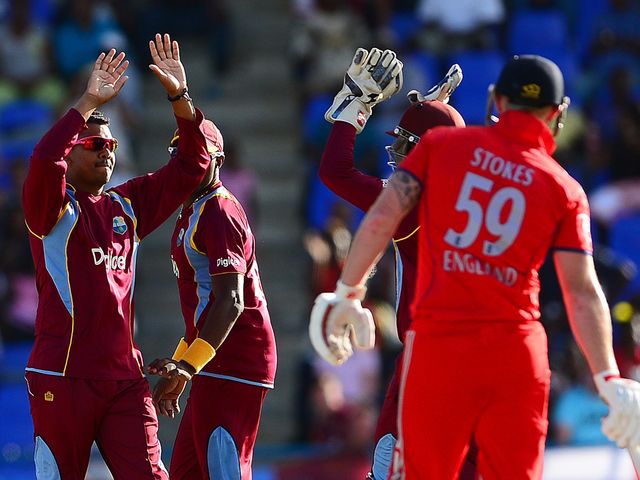 West Indies celebrate taking the wicket of Ben Stokes