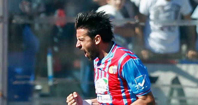 Nicolas Spolli celebrates for Catania