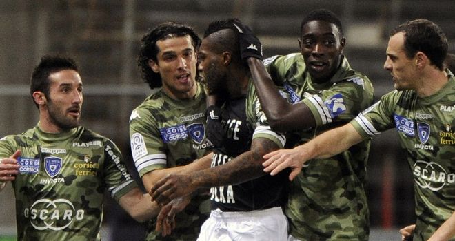 Djibril Cisse celebrates the opening goal