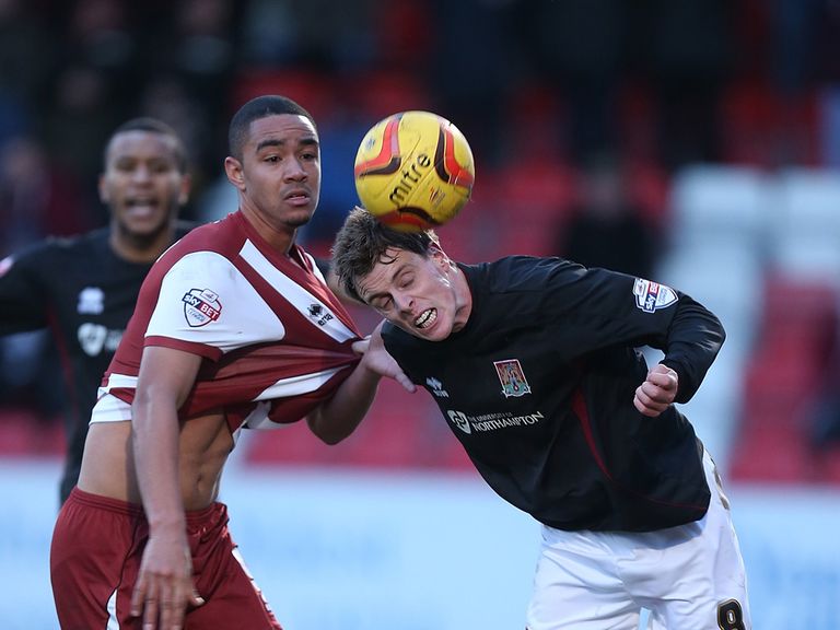 Ian Morris of Northampton Town attempts to head the ball