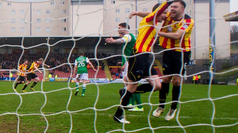 Partick players celebrate their second goal at Firhill Stadium