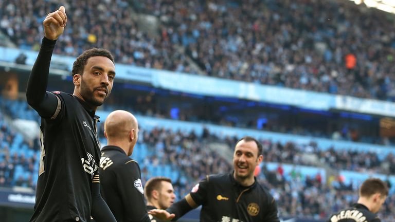 James Perch: Celebrates scoring Wigan's second goal at Etihad Stadium