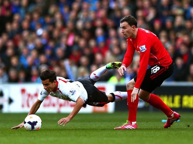 Philippe Coutinho takes a tumble
