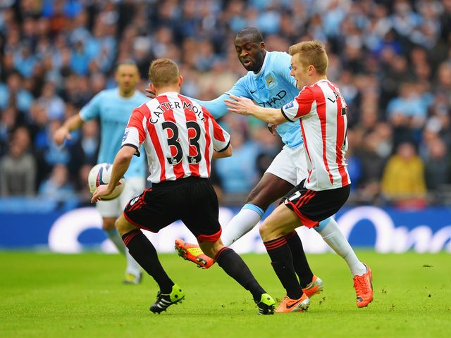 Yaya Toure is put under pressure