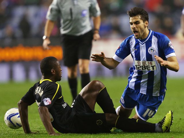 Jordi Gomez takes a tumble
