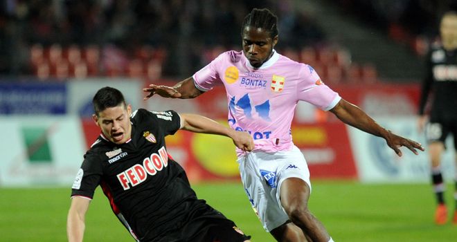 Eric Tie Bi vies with Monaco's James Rodriguez