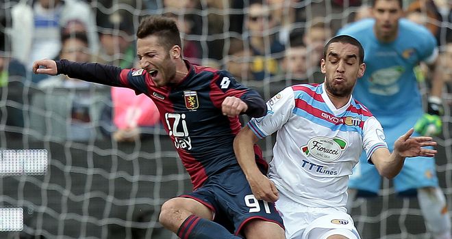 Andrea Bertolacci tumbles to the ground