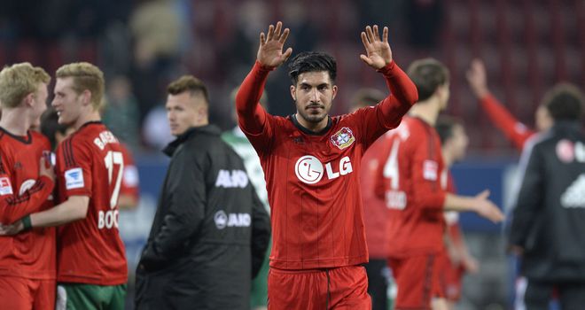 Leverkusen's midfielder Emre Can celebrates at full time