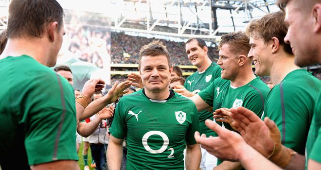 Ireland players congratulate Brian O'Driscoll on Saturday in Dublin