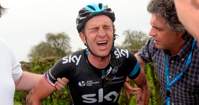 Ian Stannard is helped to his feet after falling into a ditch at Gent-Wevelgem (Picture: Graham Watson)