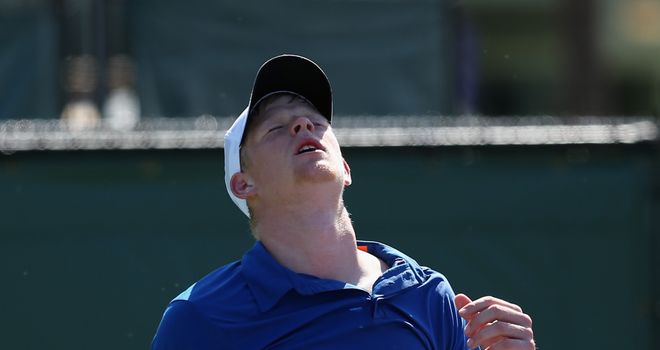 Kyle Edmund of Great Britain dejected after losing to to Julien Benneteau of France in Miami