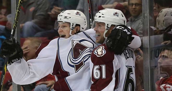 Nathan MacKinnon celebrates Thursday's match winner with scorer Andre Benoit