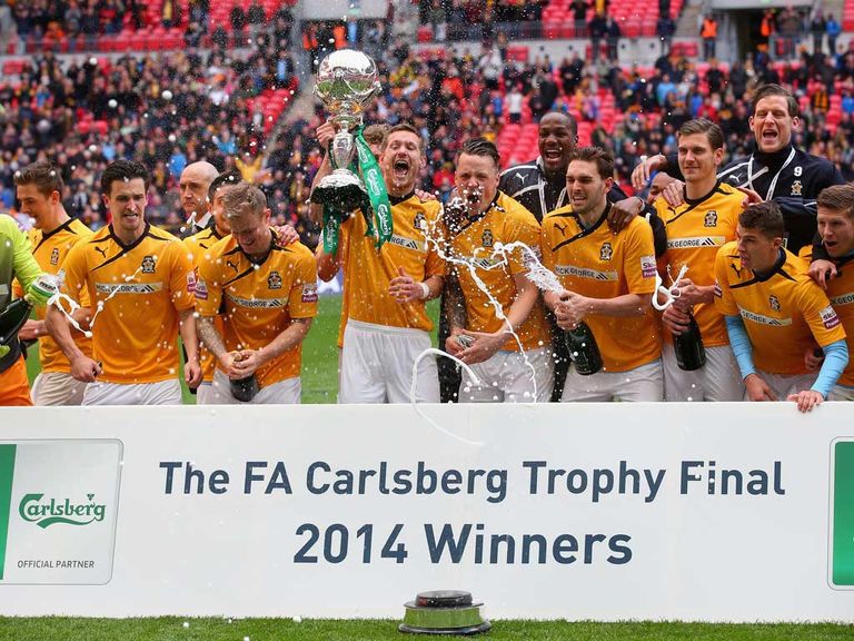 Cambridge celebrate their FA Trophy final victory at Wembley