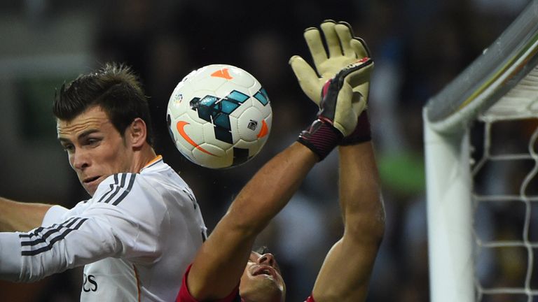Gareth Bale goes up for a header
