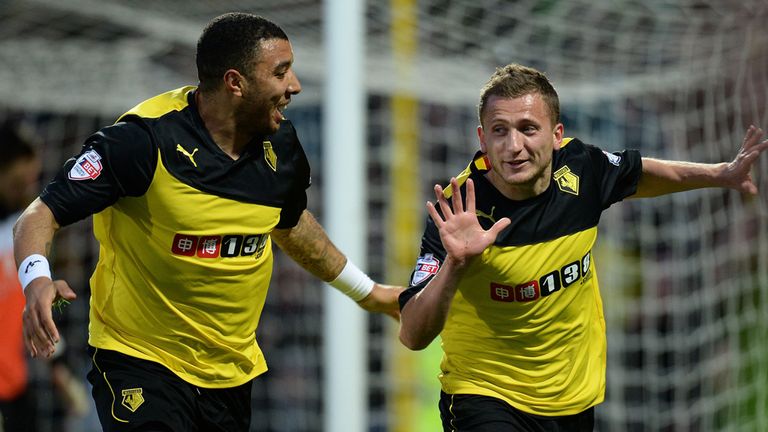 Almen Abdi (r): Celebrates the opener with fellow scorer Troy Deeney