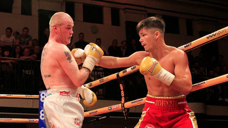 Johnny Coyle (R): Prizefighter champion