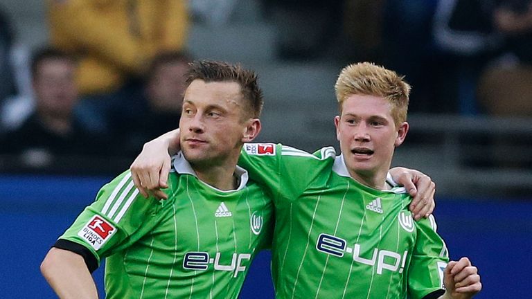 Ivica Olic (left) of Wolfsburg celebrates after scoring their first goal