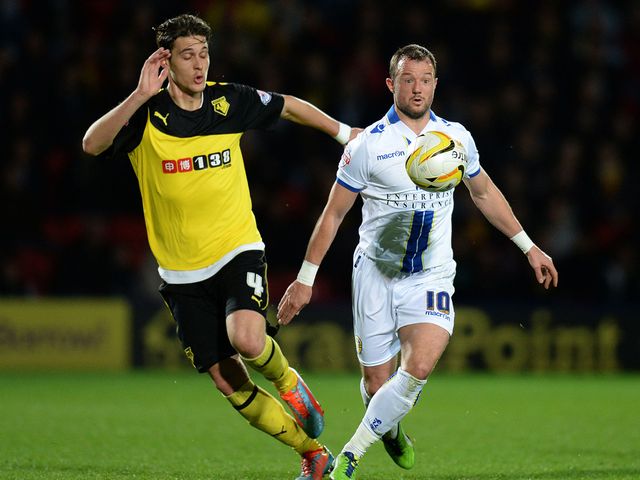 Watford's Gabriele Angella challenges Noel Hunt
