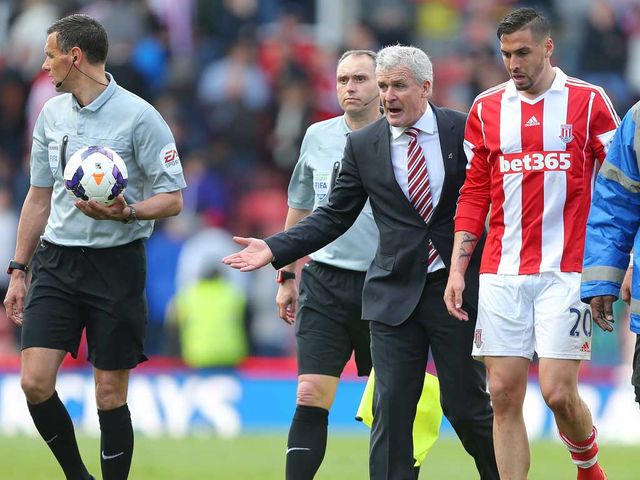 Hughes was livid with referee Marriner