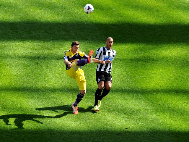 Swansea's Jordi Amat (left) and Newcastle's Yoan Gouffran