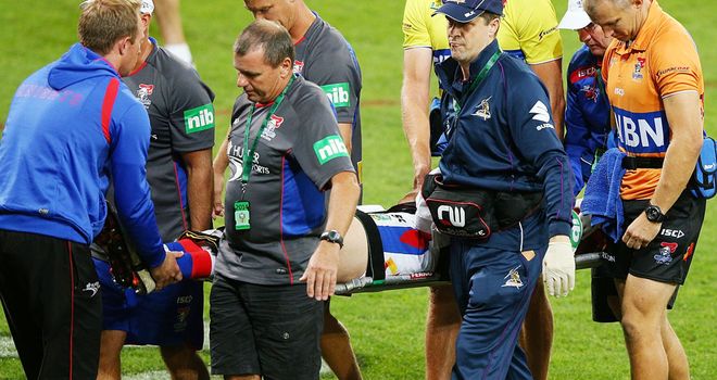 Alex McKinnon being carried off the pitch in Melbourne on March 24