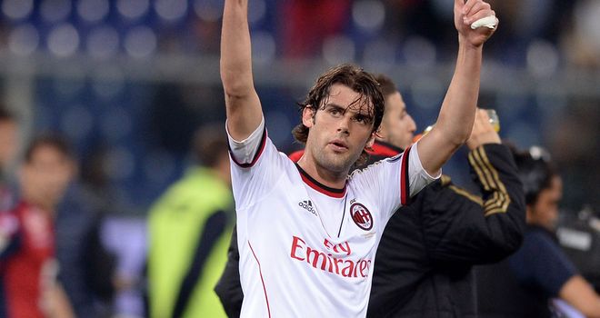 Andrea Poli celebrates Milan's win