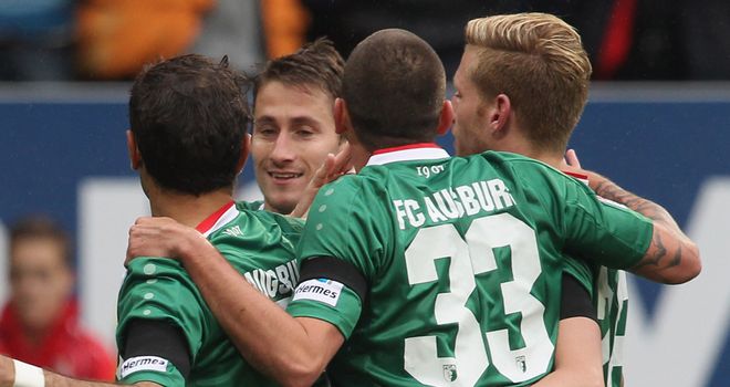 Augsburg celebrate their opening goal
