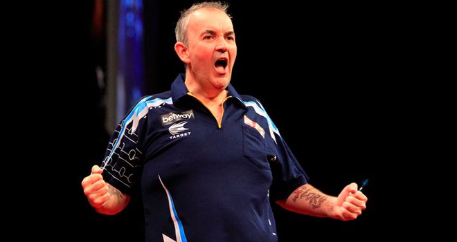 Phil Taylor: Doubling up, along with opponent Dave Chisnall, in Birmingham