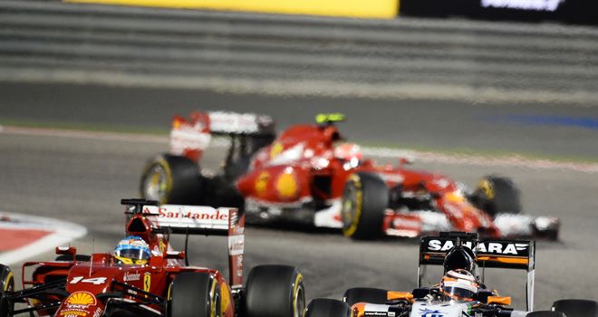 Nico Hulkenberg passes Fernando Alonso