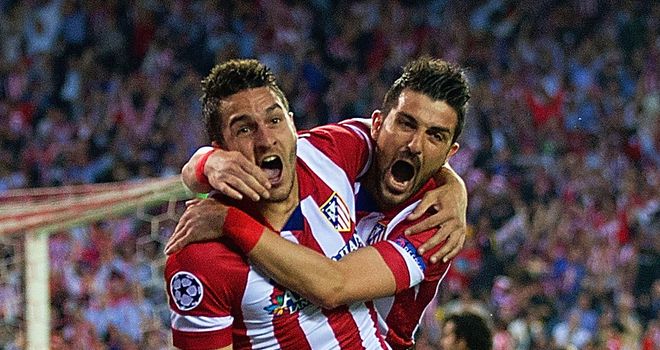 Koke (l): Celebrates Atletico&#39;s winner with David Villa