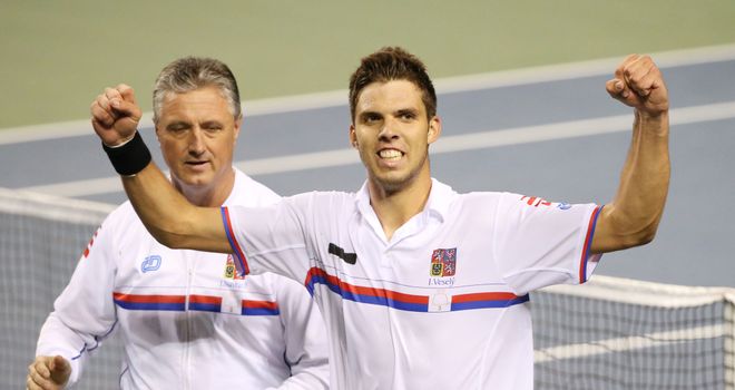 Jiri Vesely of the Czech Republic celebrates with captain Jaroslav Navratil