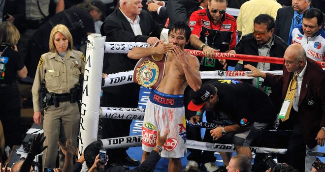 Manny Pacquiao: Celebrates after his victory over Timothy Bradley during their WBO world welterweight champion.