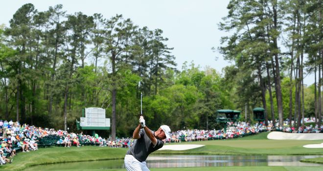 Thomas Bjorn hits his tee shot on the 16th hole on his way to a 68