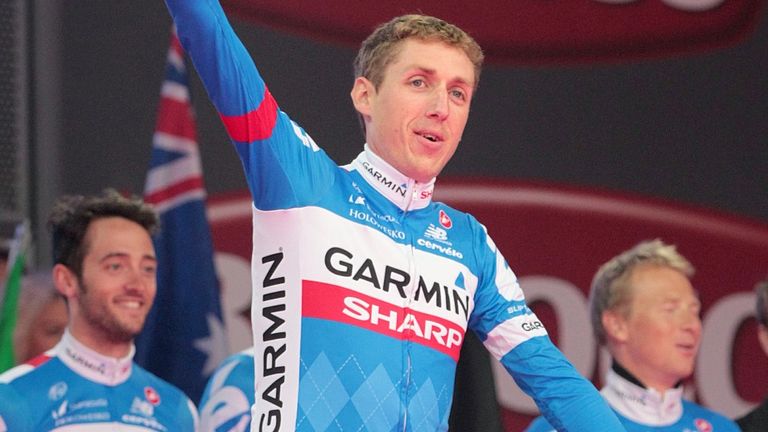 Dan Martin waves to thousands of fans at the Giro d'Italia team presentation in Belfast