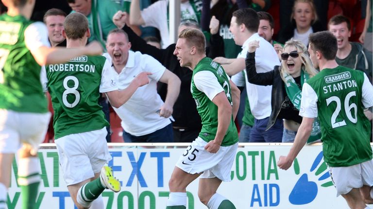 Jason Cummings (c) celebrates the first of his two goals