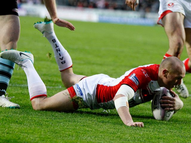 Luke Walsh dives in for a St Helens try