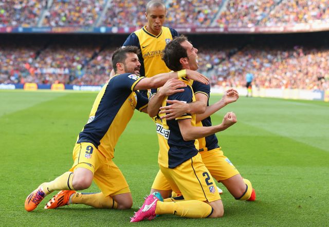 Diego Godin celebrates netting Atletico Madrid's equaliser