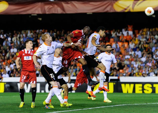 Stephane Mbia powers home his late header for Sevilla