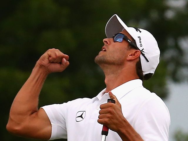 Adam Scott celebrates his win over Jason Dufner in the play-off