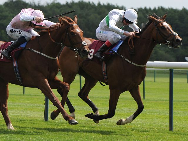 Sultanina ridden by William Buick (left) beats Freedom's Light at Haydock