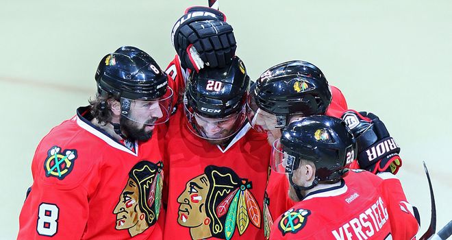 Chicago Blackhawks celebrate as they beat Los Angeles Kings to keep series alive