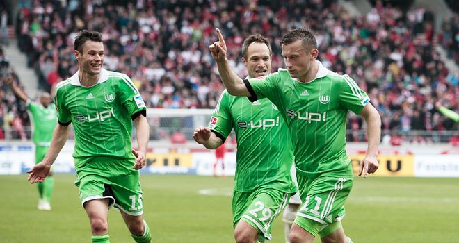 Ivica Olic celebrates his vital goal