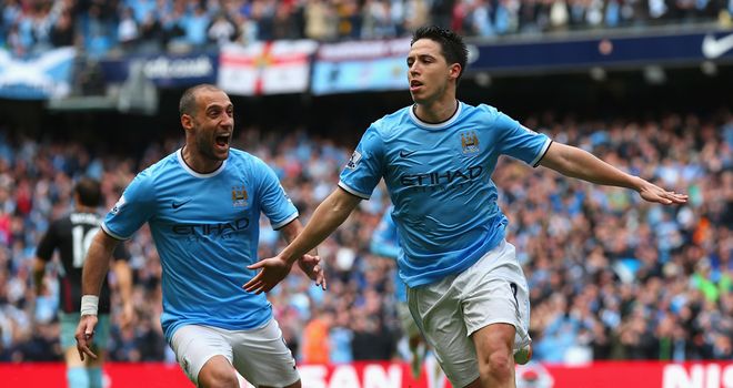 Samir Nasri celebrates after opening the scoring