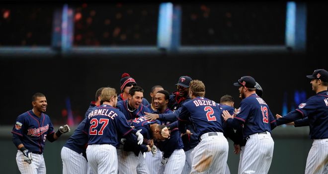 The Minnesota Twins mob Aaron Hicks after his late heroics